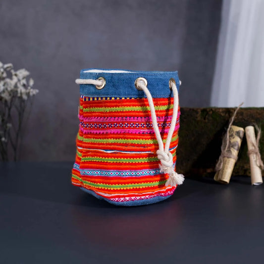 Vindigo orange embroidered canvas bucket bag front view