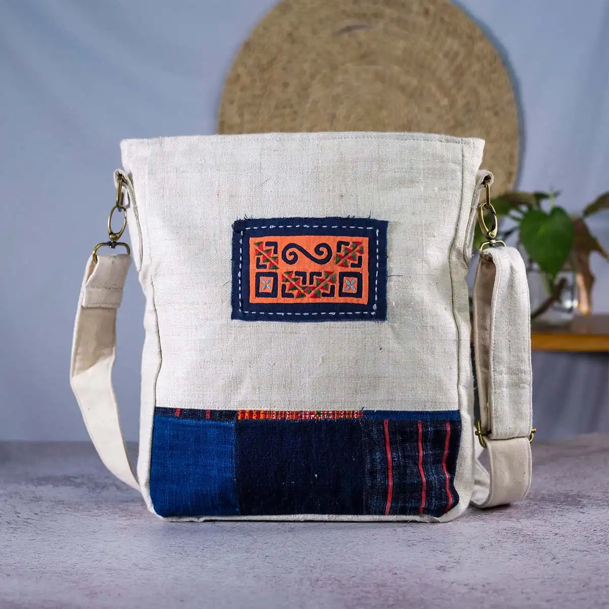 Vindigo beige hemp crossbody bag with tribal embroidery patch front view