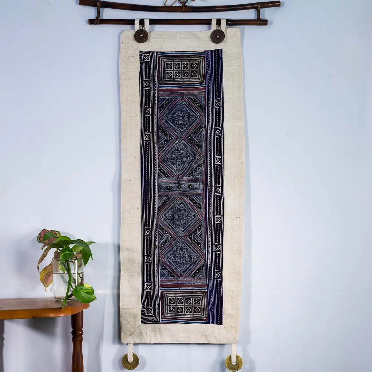 Vindigo indigo hemp batik tapestry displayed with plants