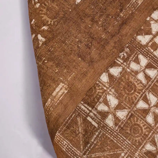Vindigo brown ethnic geometric fabric roll folded angle view