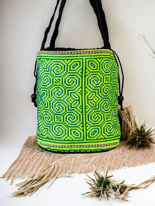 Neon green embroidery shoulder bag with string to close