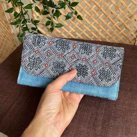 Vindigo long purse denim blue hemp diamond eye pattern front view with hand