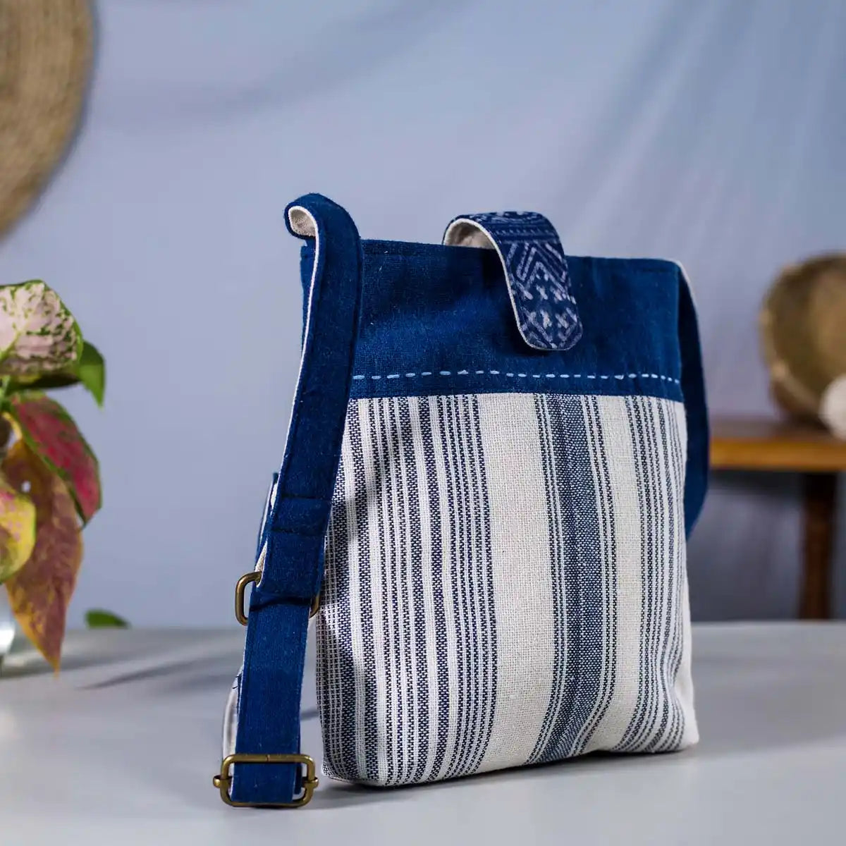 Vindigo black and white striped hemp crossbody bag with indigo flap side angle