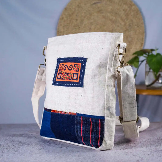 Vindigo natural hemp crossbody bag side view with tribal fabric detail