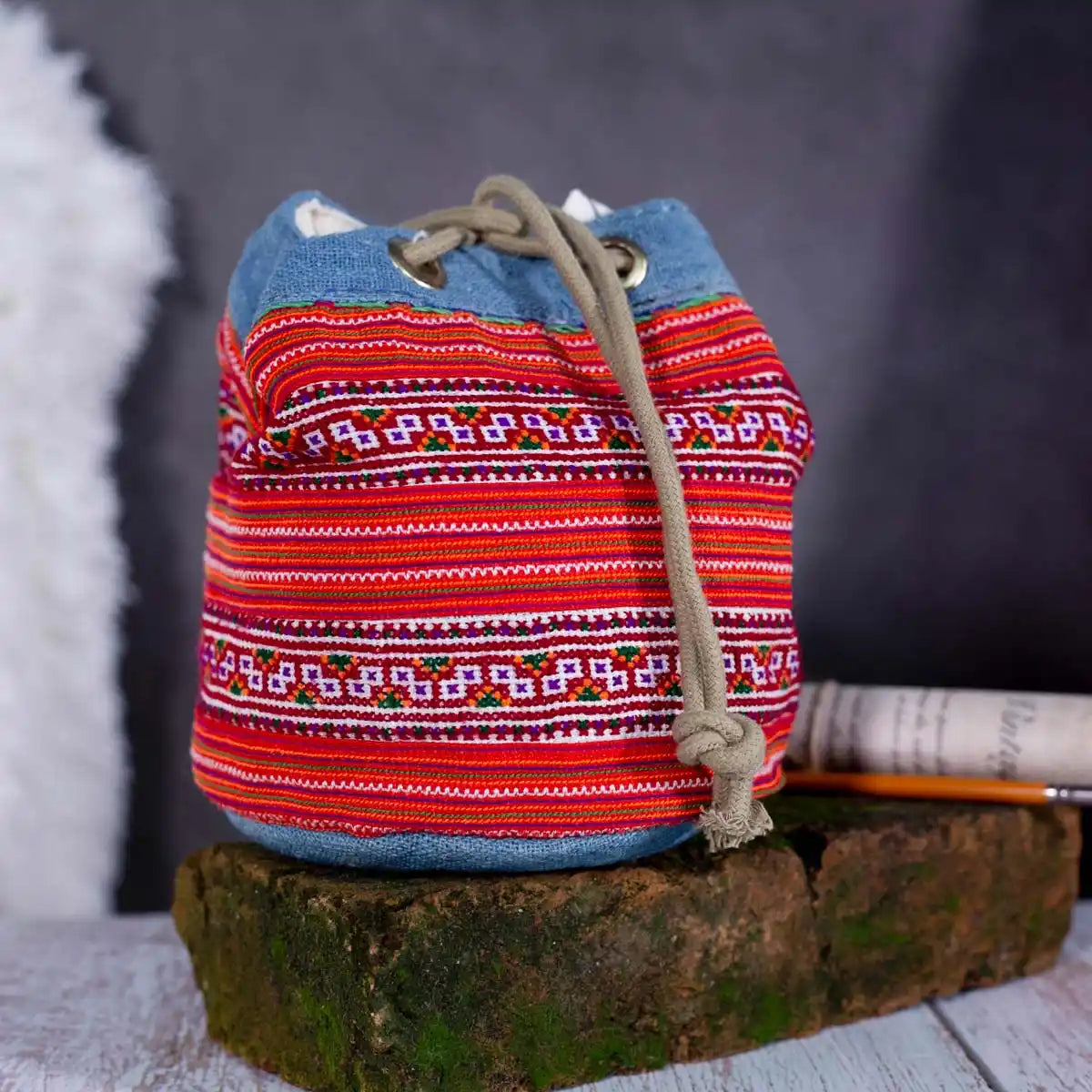 Vindigo red embroidered canvas bucket bag side view