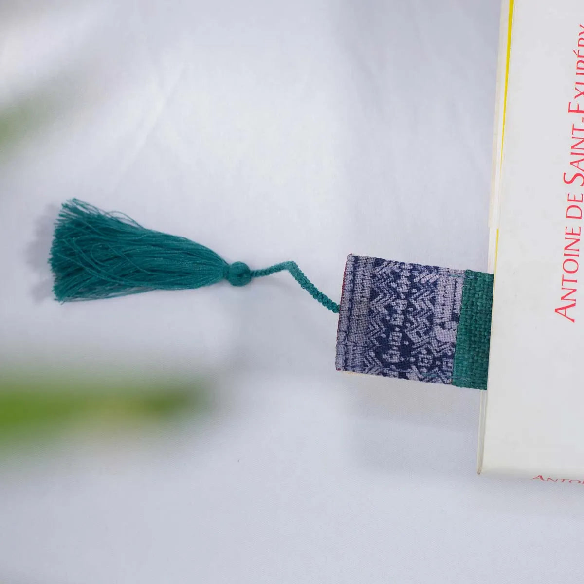Vindigo teal hemp batik pattern bookmark side angle on book