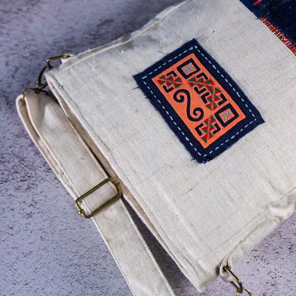 Vindigo handmade hemp bag close-up of orange tribal patch and stitching