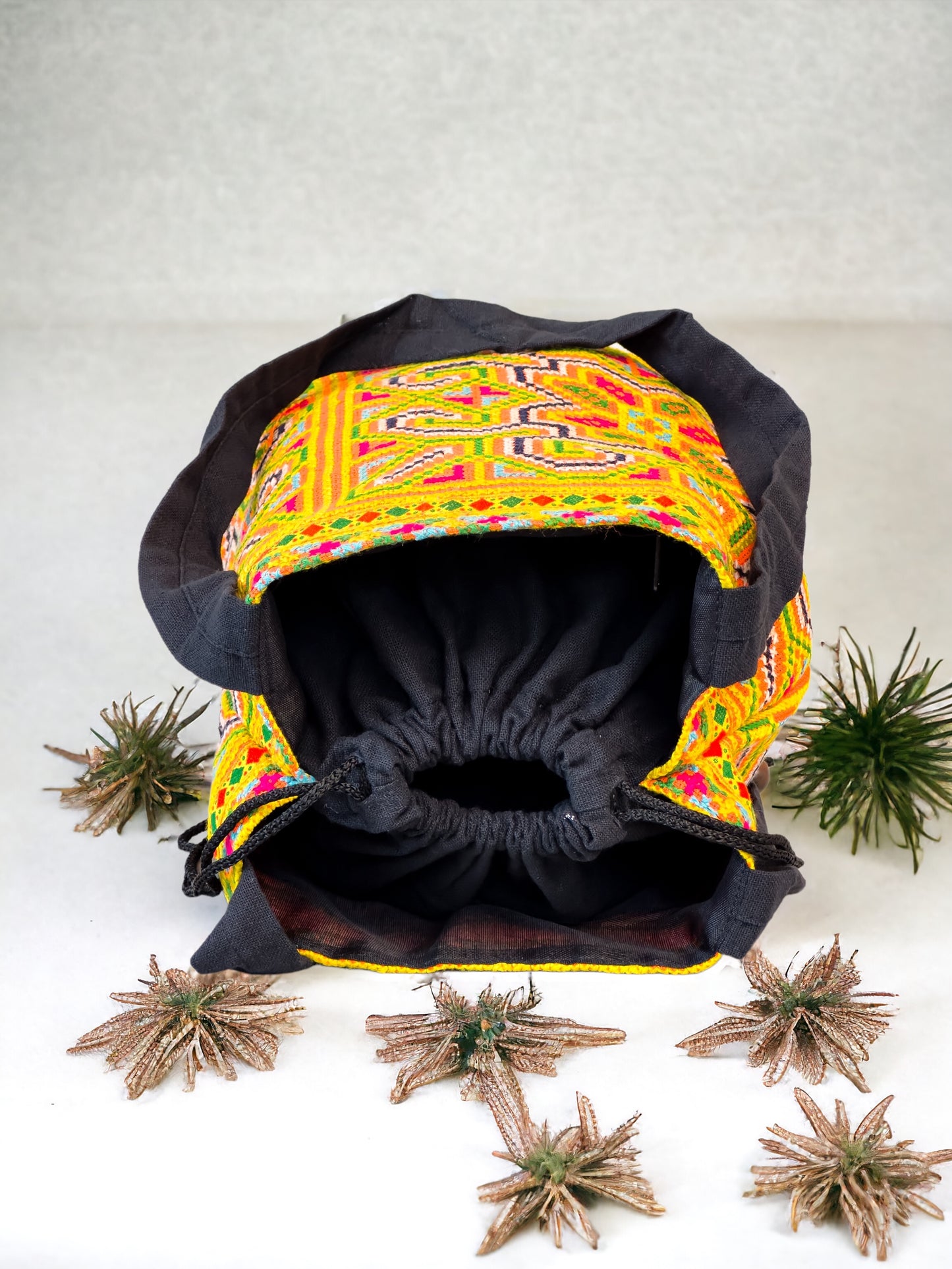 Yellow and blue embroidery shoulder bag with string to close