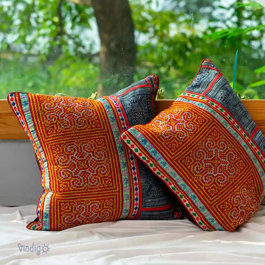 Vindigo cushion cover orange H’mong batik embroidered outdoor scene