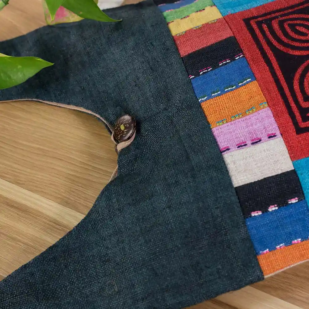 Vindigo shoulder bag teal hemp button and stripe detail close-up