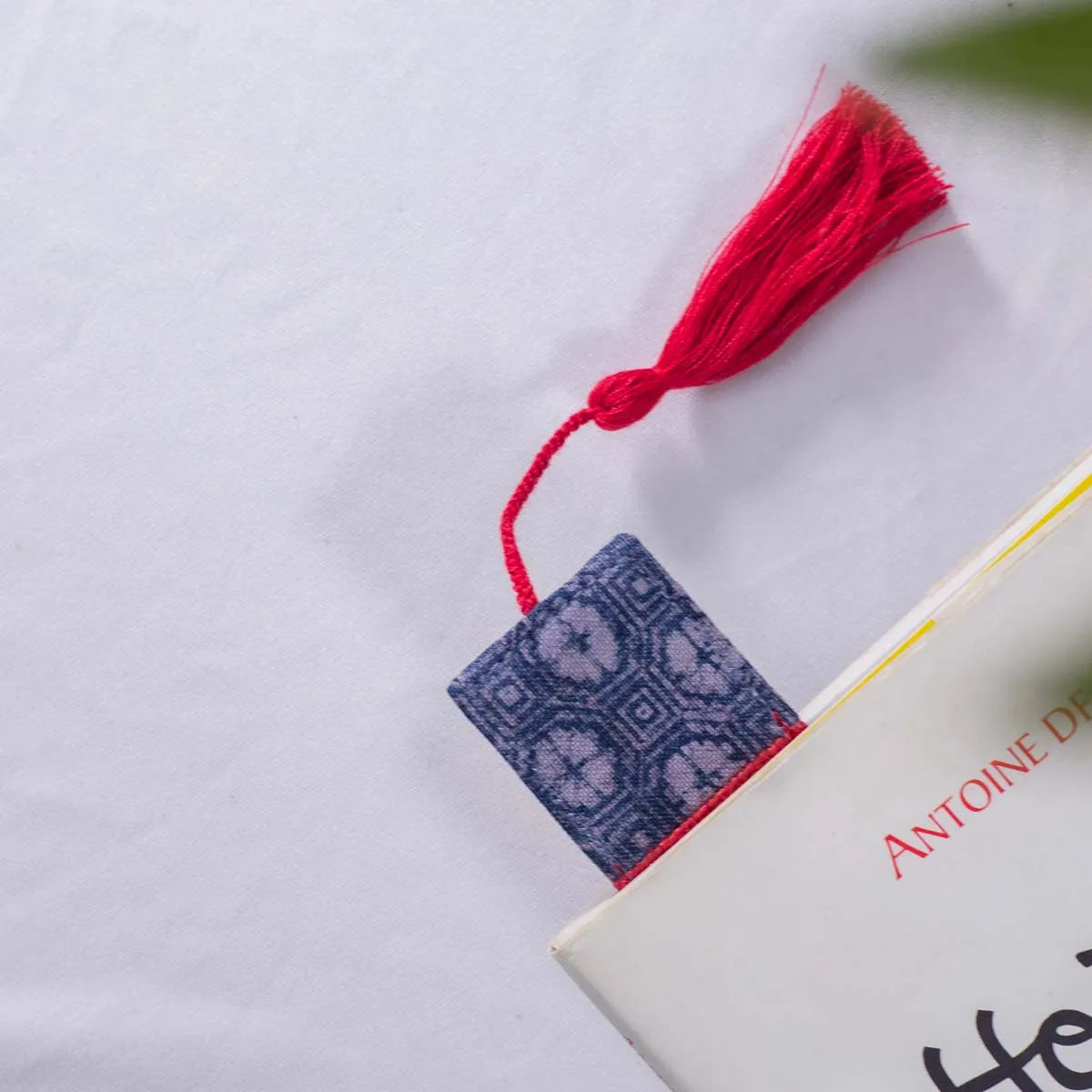Vindigo handmade red hemp batik bookmark side angle on book