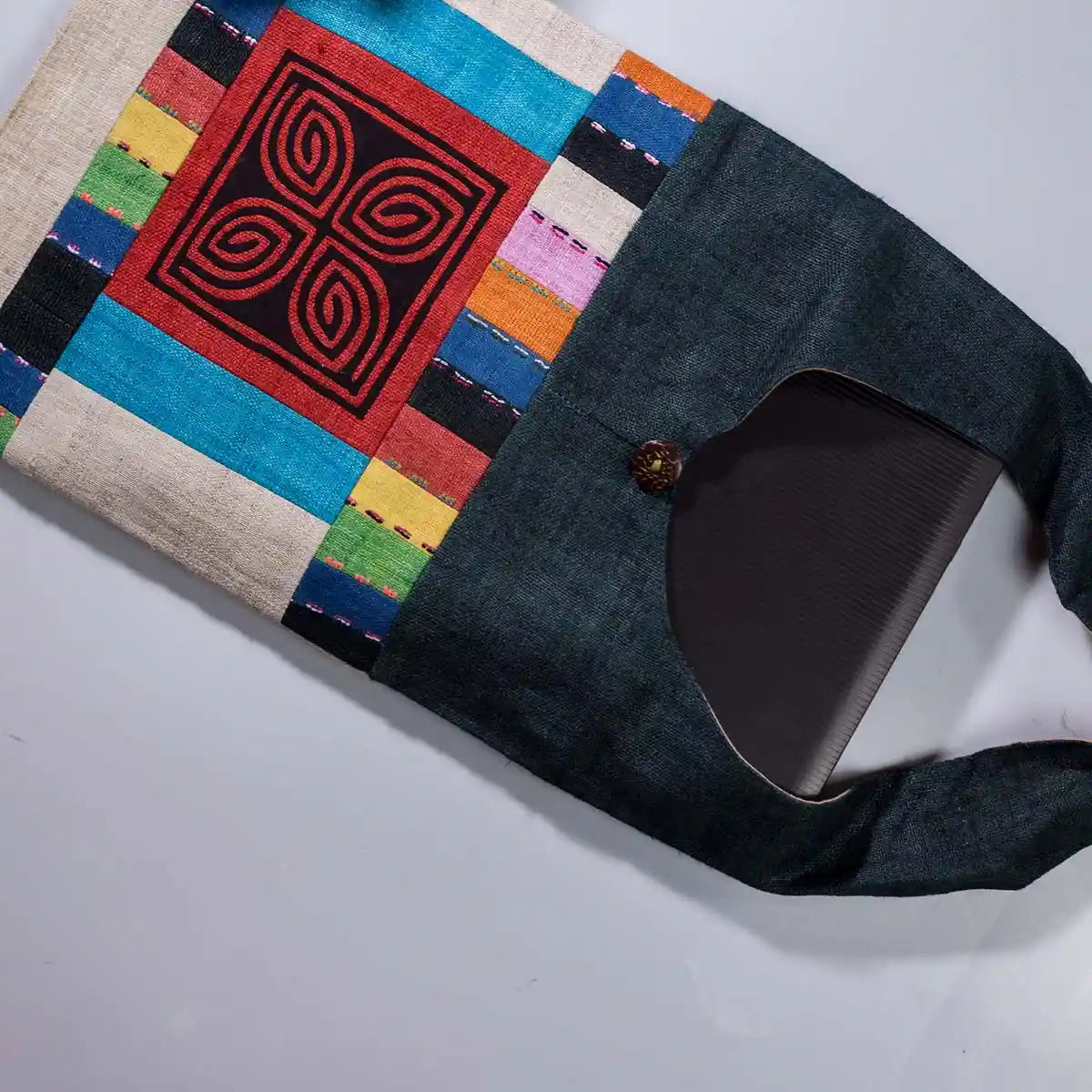 Vindigo shoulder bag teal hemp red spiral embroidery front angle view