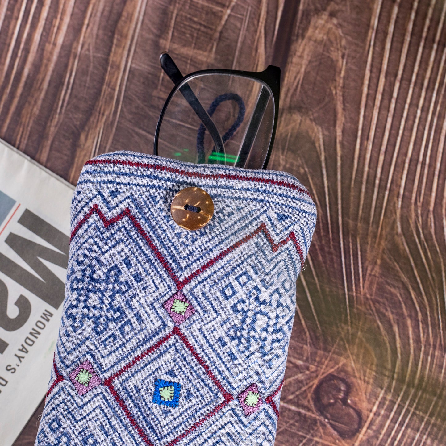 Phone case / glass case, repurposed H'mong batik fabric, shock absorption layer