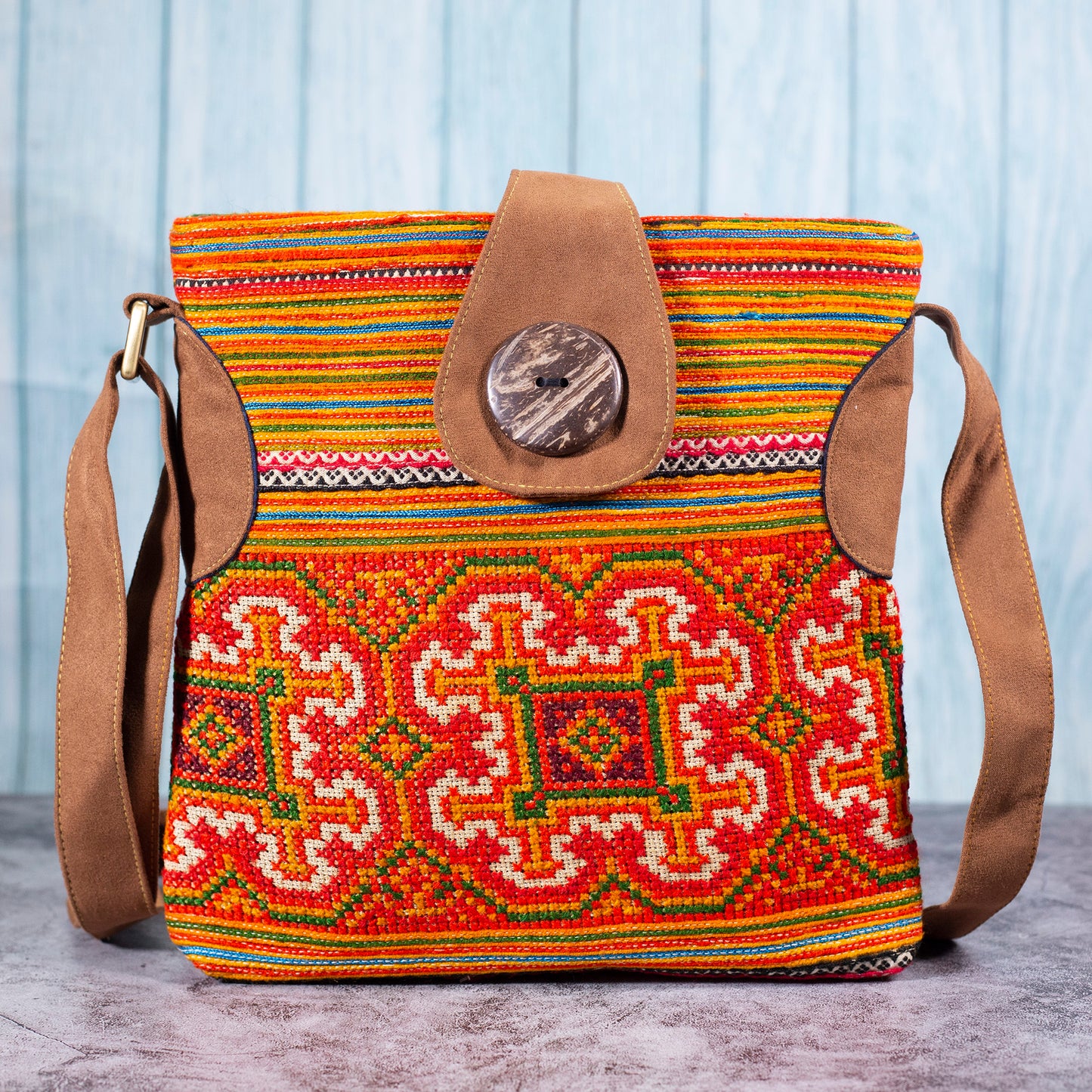 Flowery pattern, Orange embroidery cross-body bag, faux leather straps, coconut button