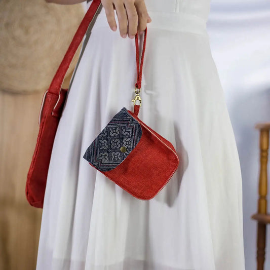 Red hemp flip phone belt bag (mobilväska) in crossbody style with vintage H’Mong patch
