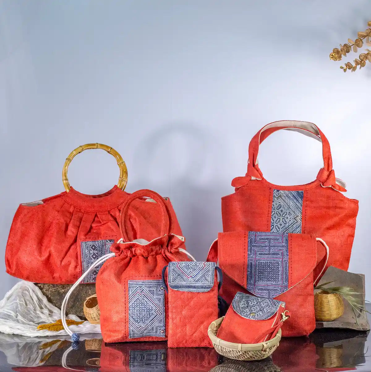 Set of red hemp mobilväskor, small phone bags with H’mong patches, handcrafted and eco-friendly.