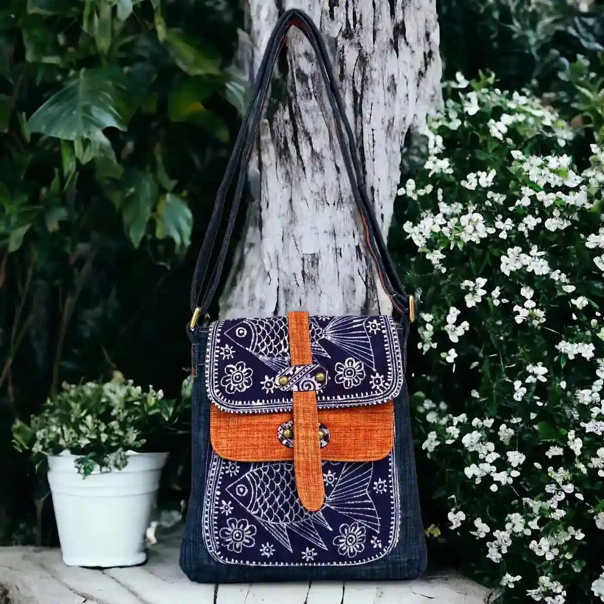 Vindigo crossbody bag denim embroidered with orange trim front view