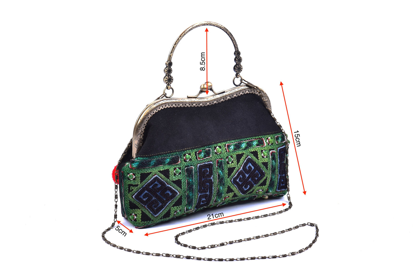 Brown faux leather bag with vintage tribal embroidery and copper-binding
