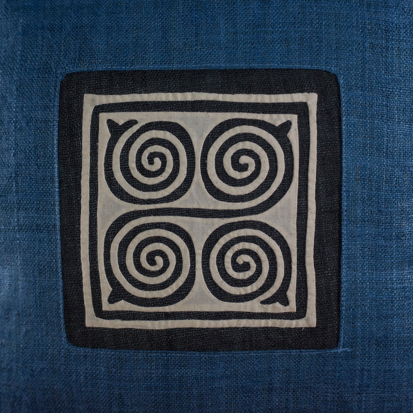 Indigo blue hemp Cushion Cover, beeswax batik corner, white hand-embroidered patch