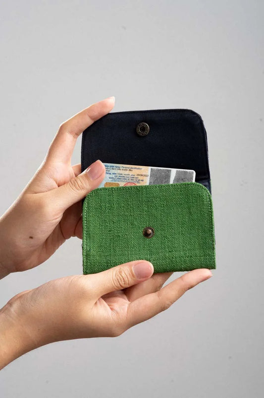 Vindigo green batik cardholder with magnetic clasp shown in hand