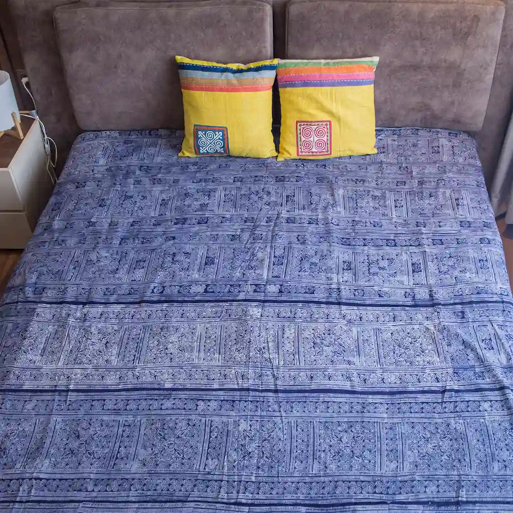 Vindigo indigo cotton bed cover with Hmong embroidery lifestyle view