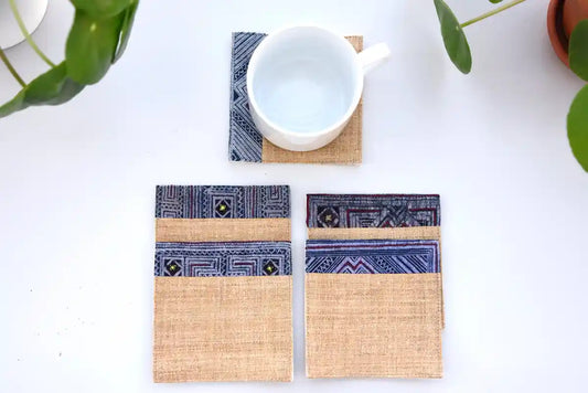 Natural hemp coasters with indigo trim styled with white cup
