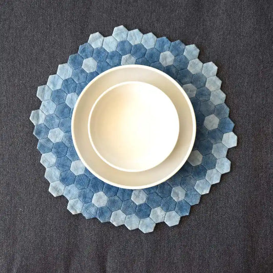 Vindigo denim blue hexagon placemat with ceramic bowl