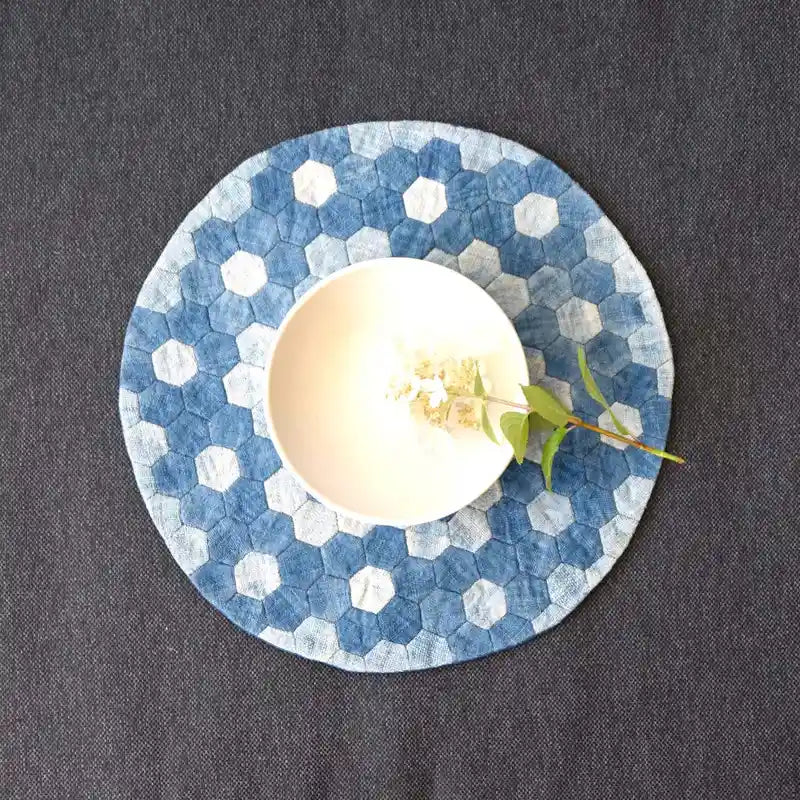 Vindigo light blue denim hexagon placemat with bowl on top