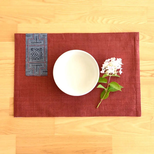 Vindigo burgundy hemp placemat with indigo napkin and bowl