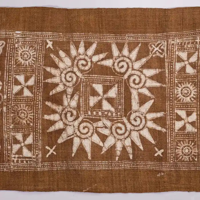 Vindigo brown fabric roll flat view with spiral and tribal motifs