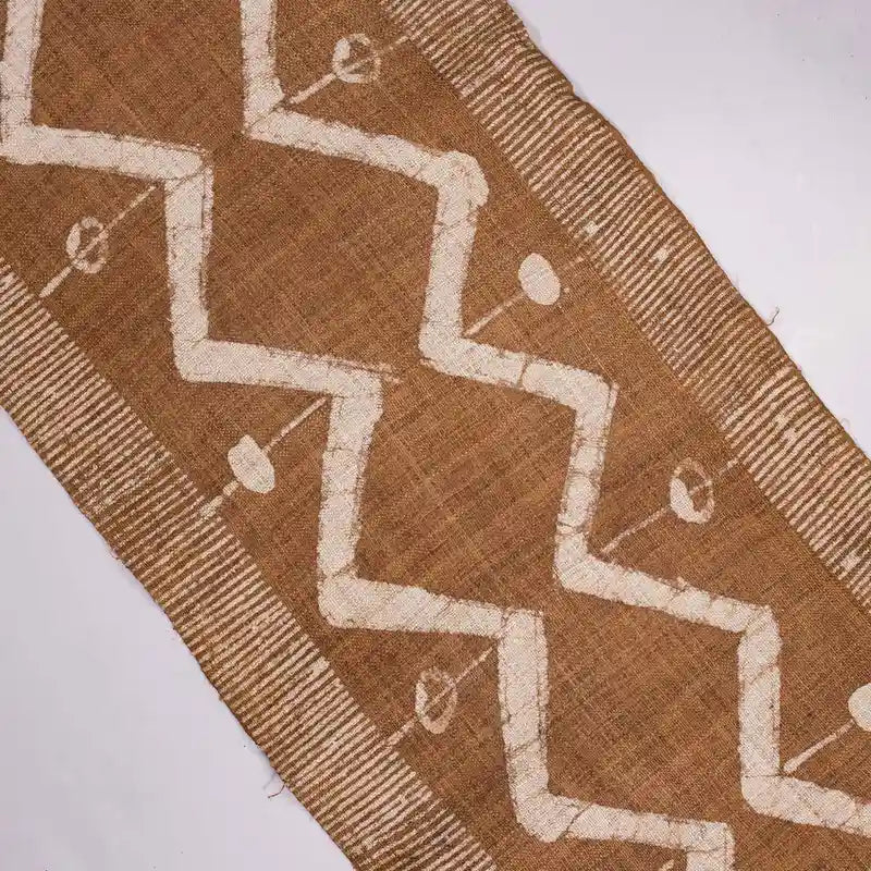 Vindigo brown tribal zigzag fabric roll top-down view