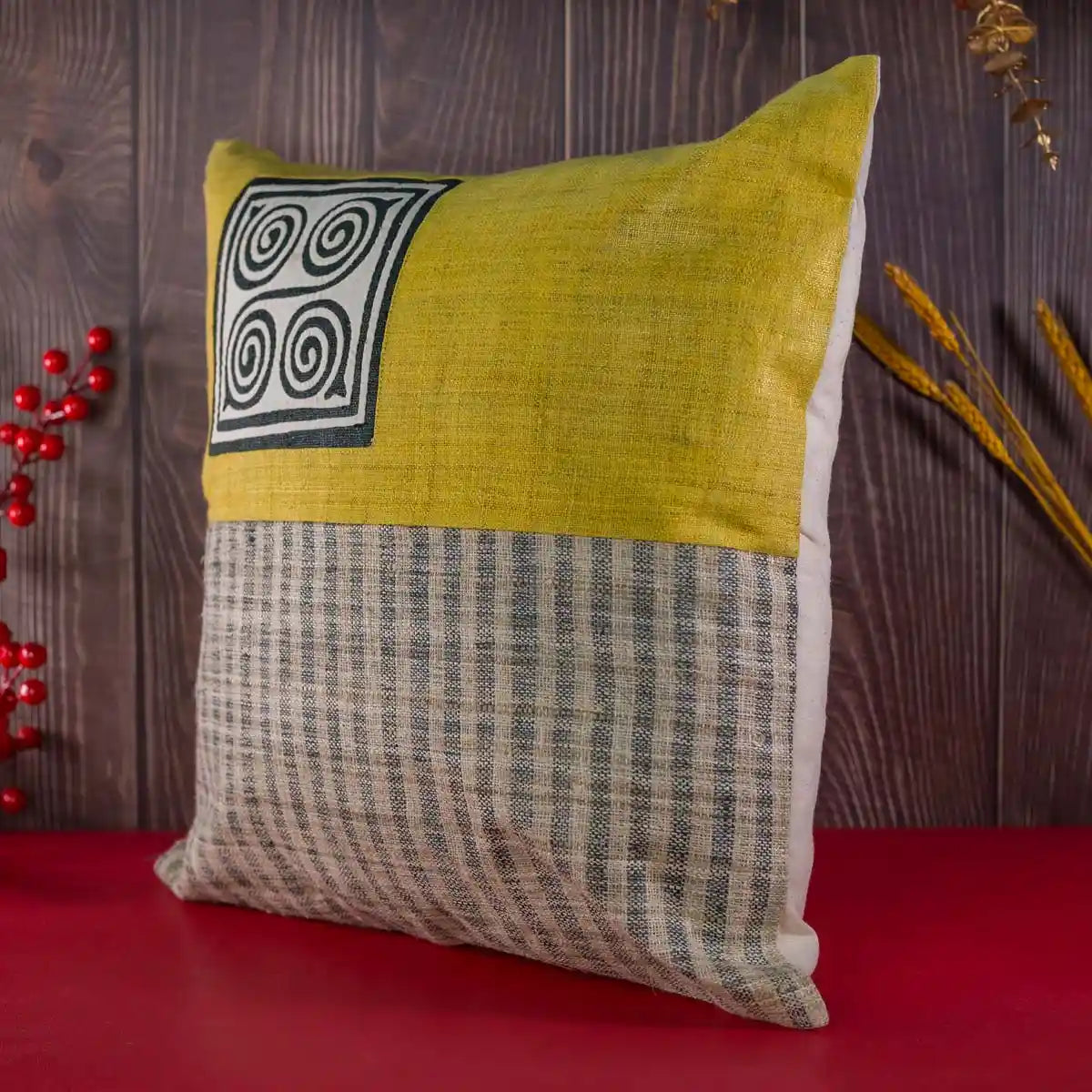 Vindigo cushion cover yellow top, striped hemp base, tribal spiral motif