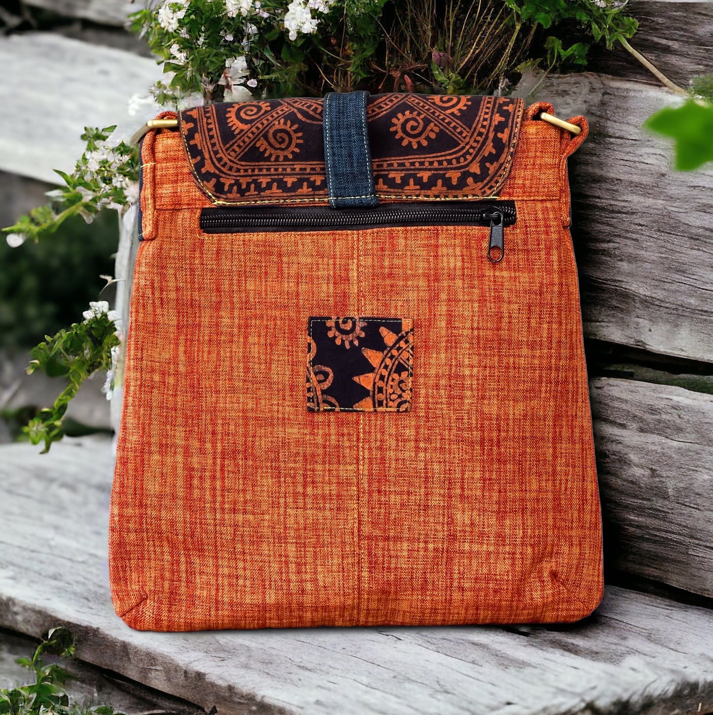 Batik cross-body bag, hand-drawn batik pattern, saffron spice orange