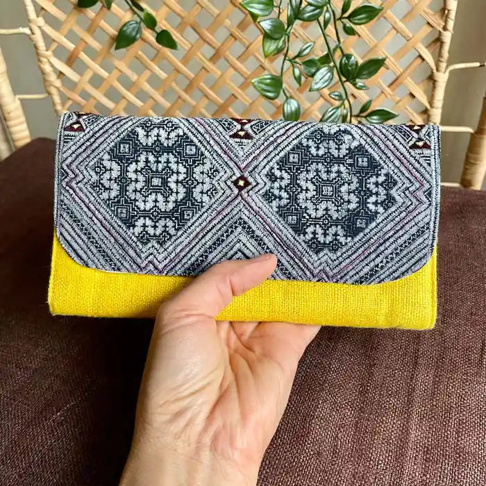 Vindigo long purse yellow hemp diamond pattern front view with hand