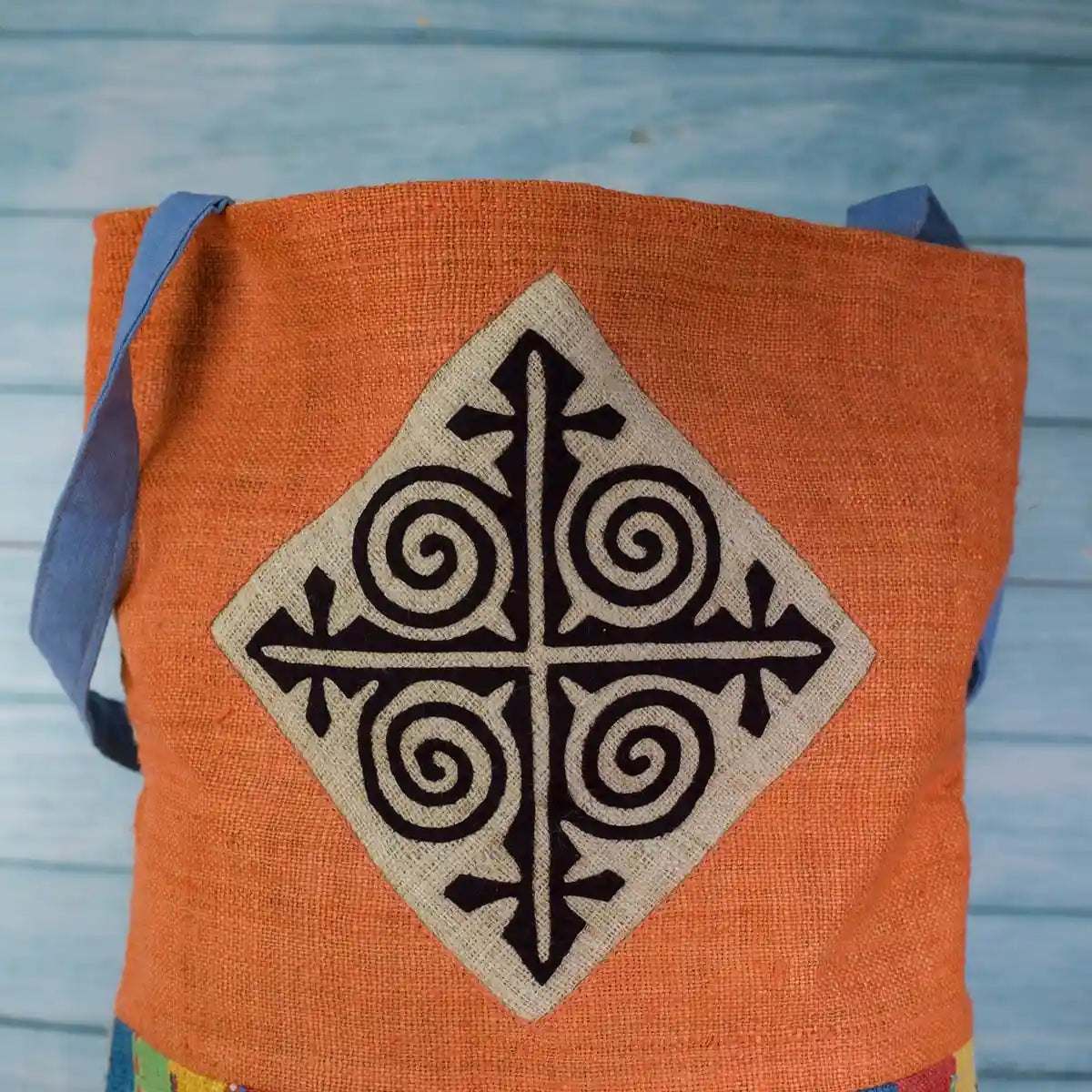 Vindigo shoulder bag orange hemp with black spiral embroidery front view