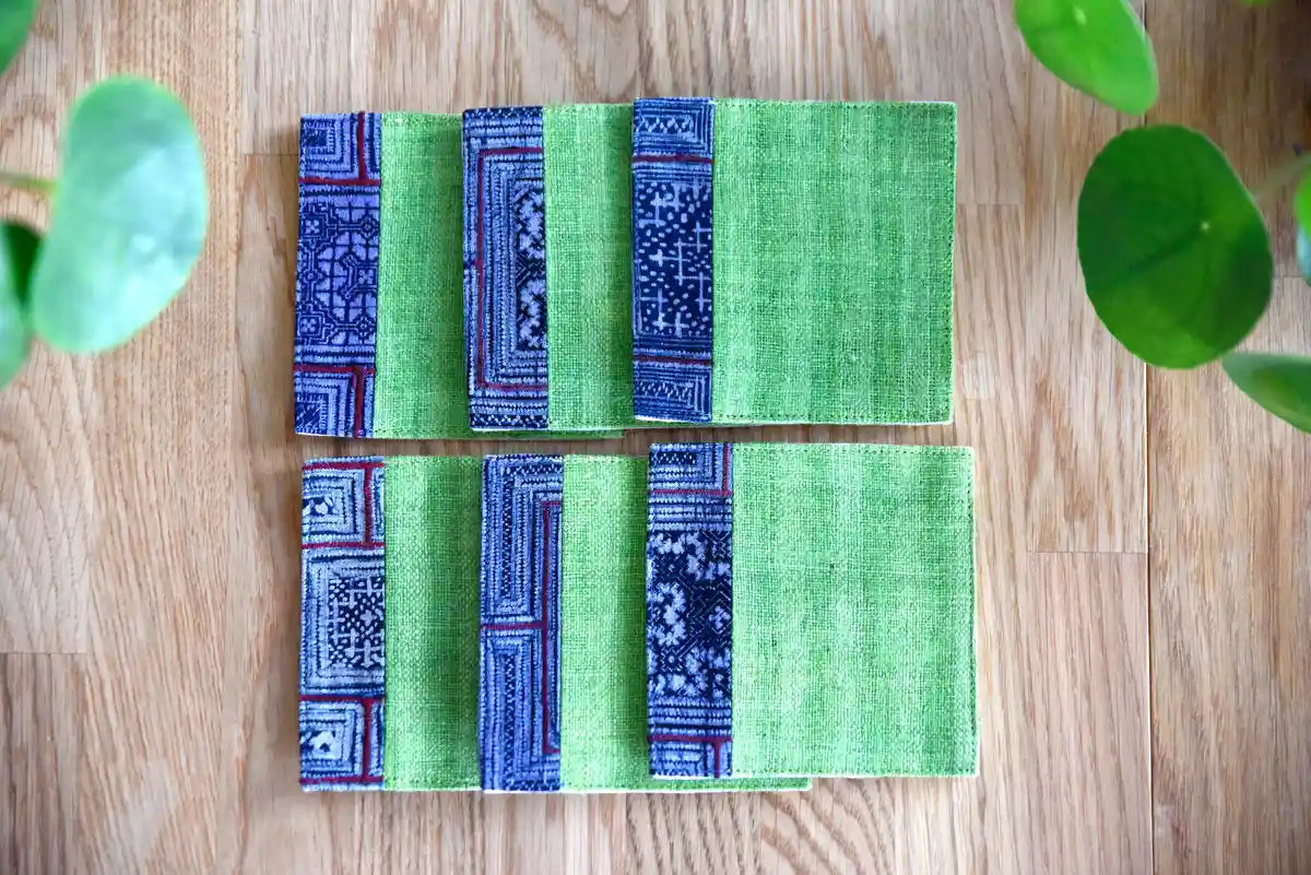 Set of handmade green hemp coasters with indigo fabric detail