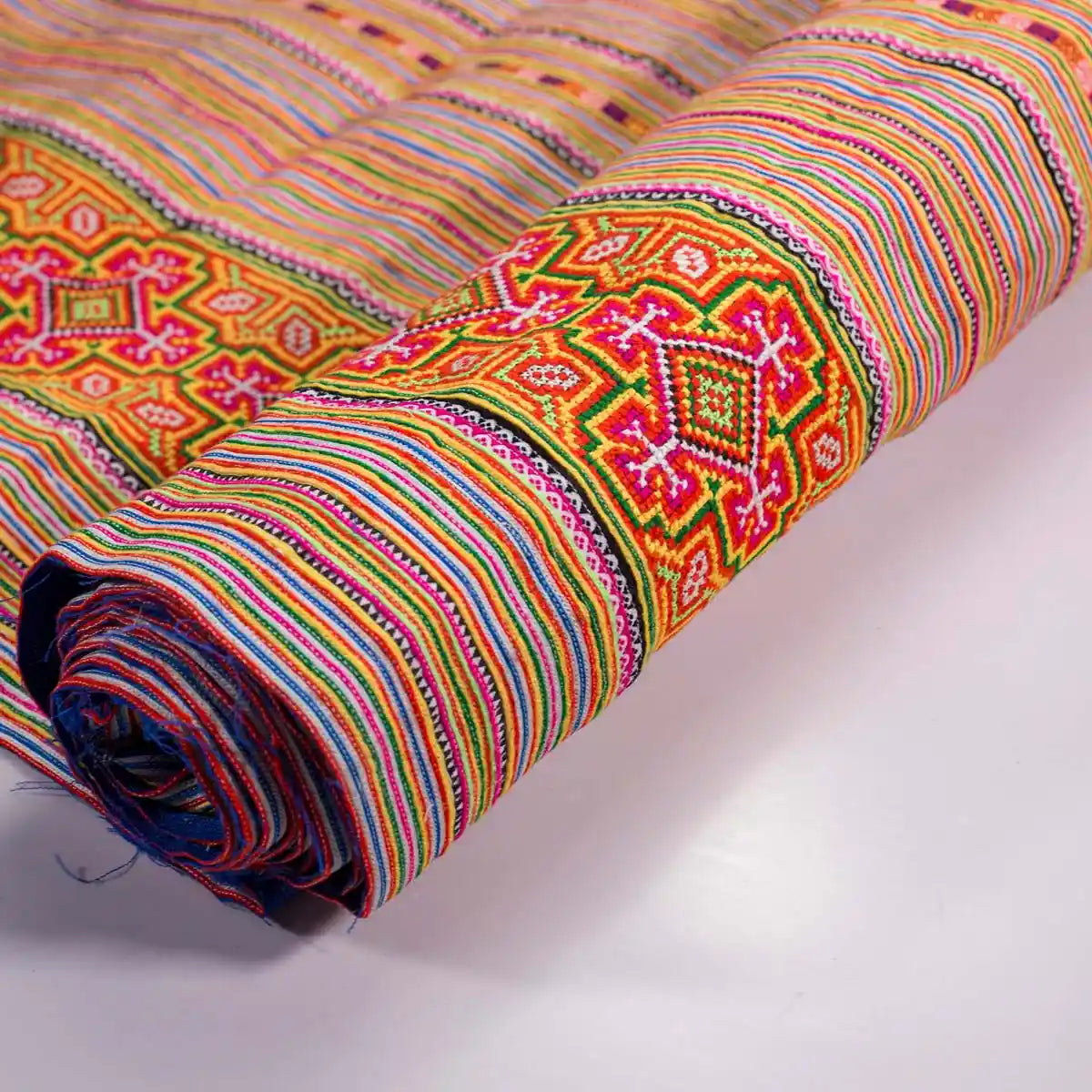 Vindigo orange striped cotton tribal embroidered fabric roll side angle