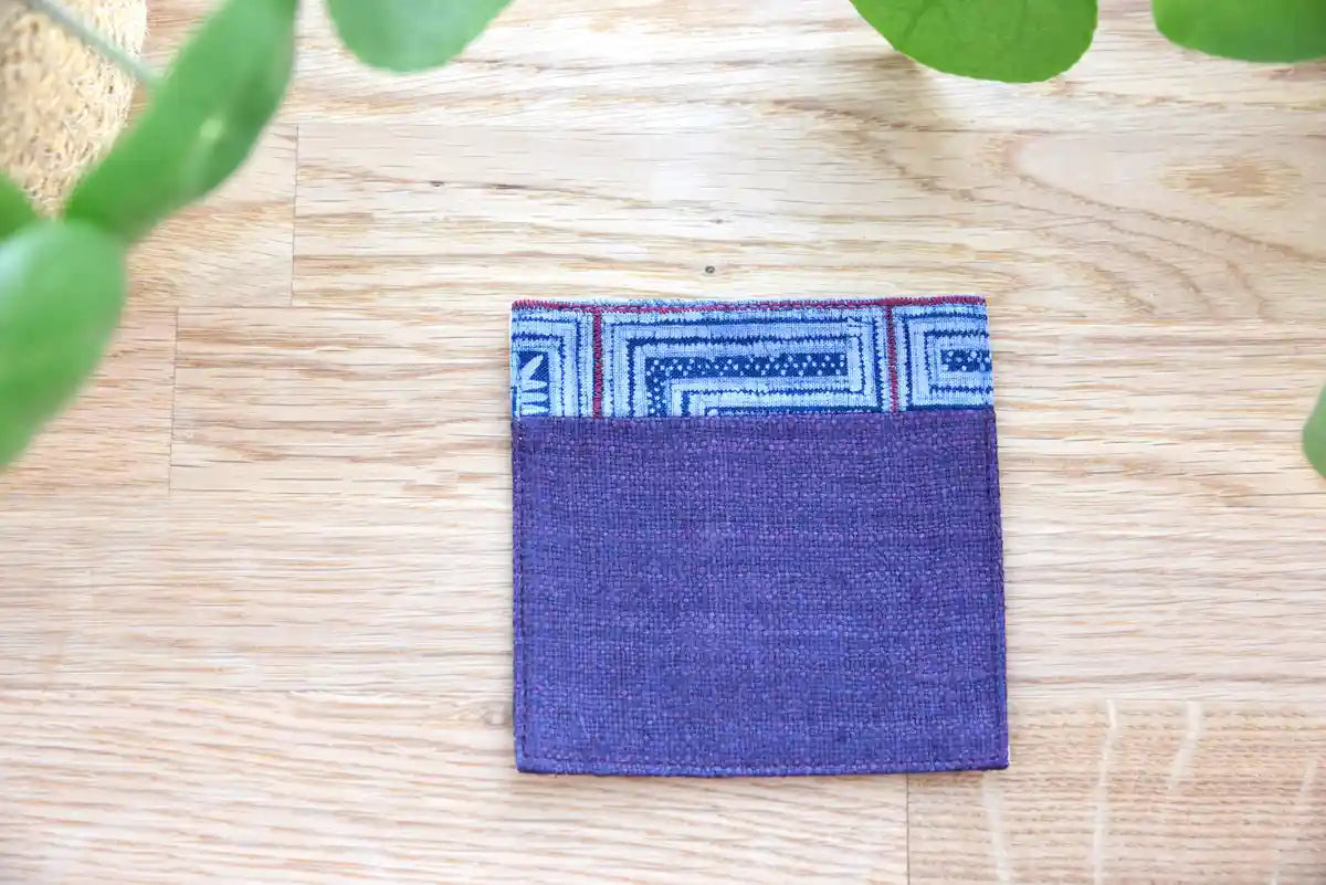 Close-up of detailed tribal pattern on indigo hemp coaster
