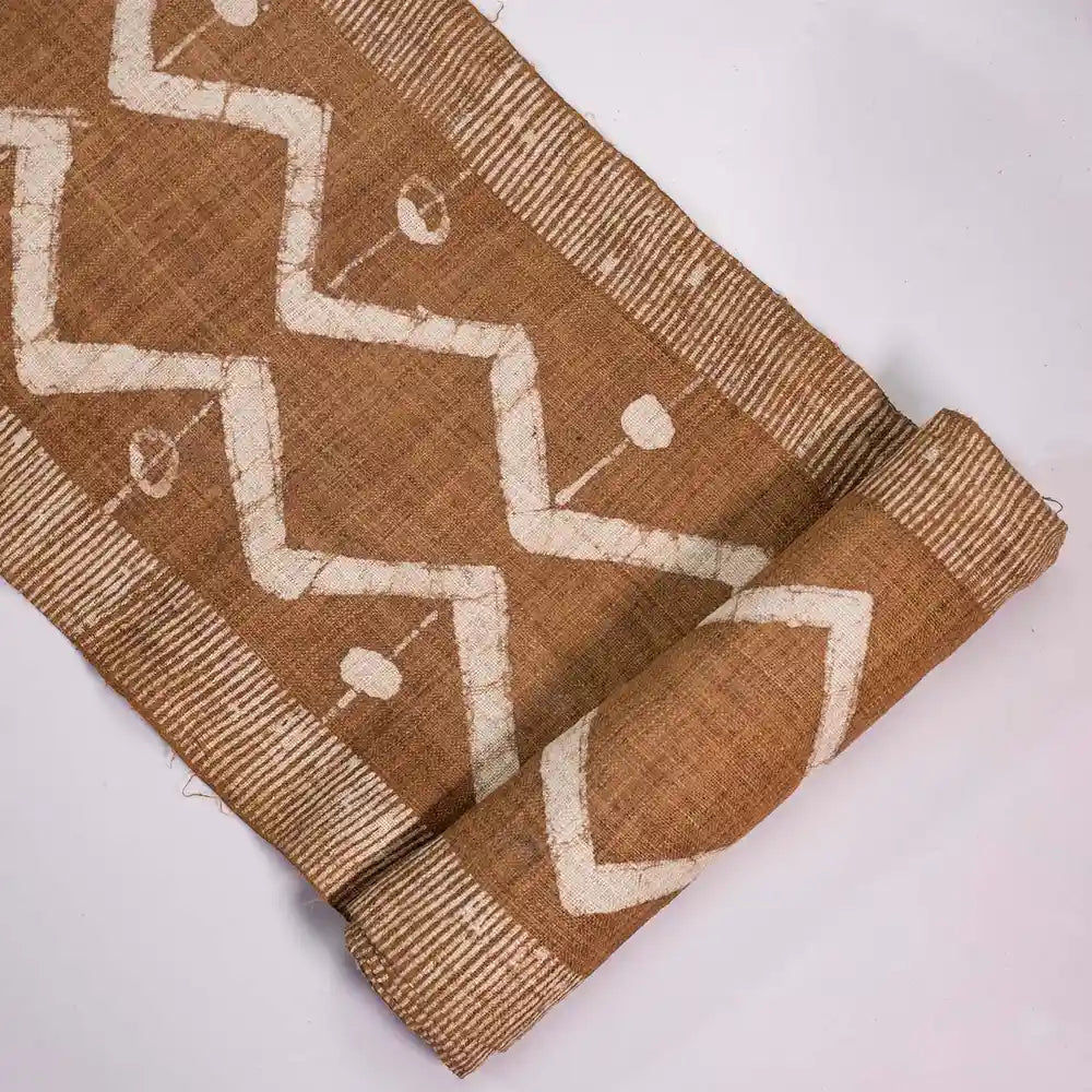 Vindigo brown tribal zigzag fabric roll folded view