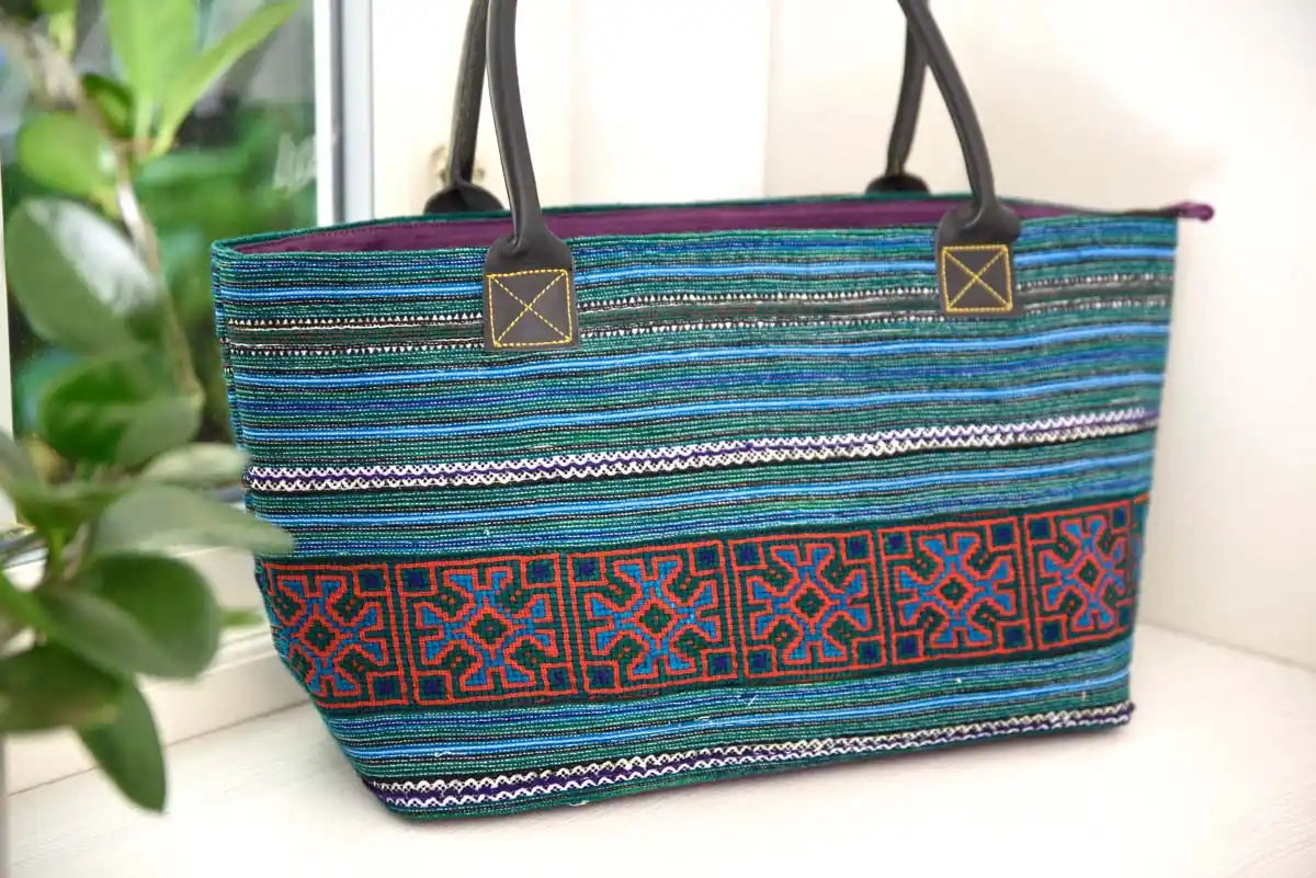 Blue and purple tribal hemp tote near bright window light