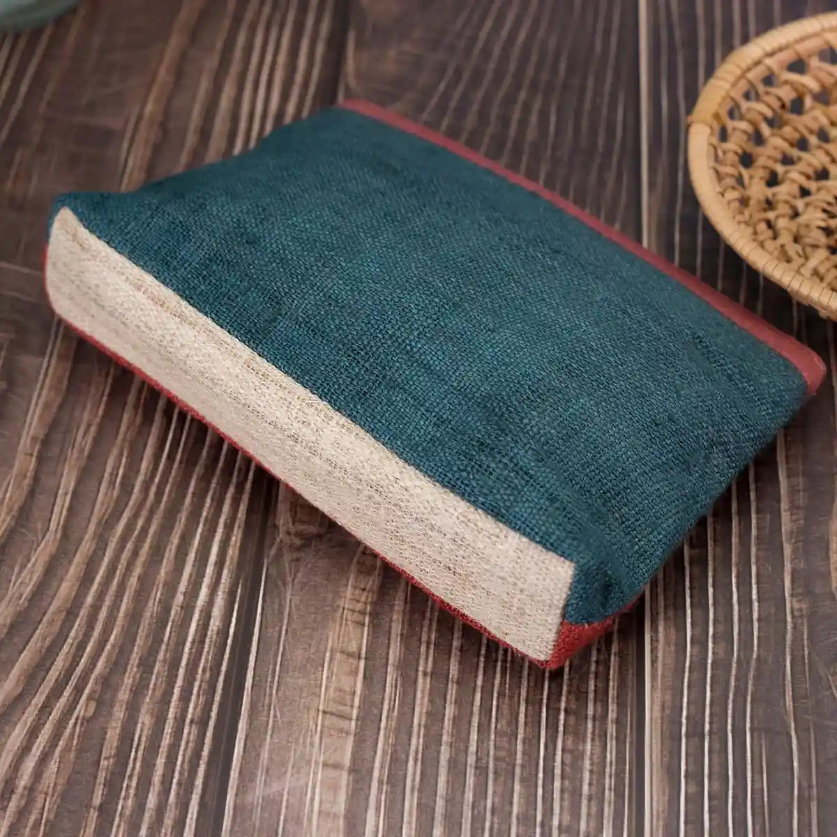 Vindigo hemp cosmetic bag bottom view showing plain blue hemp base