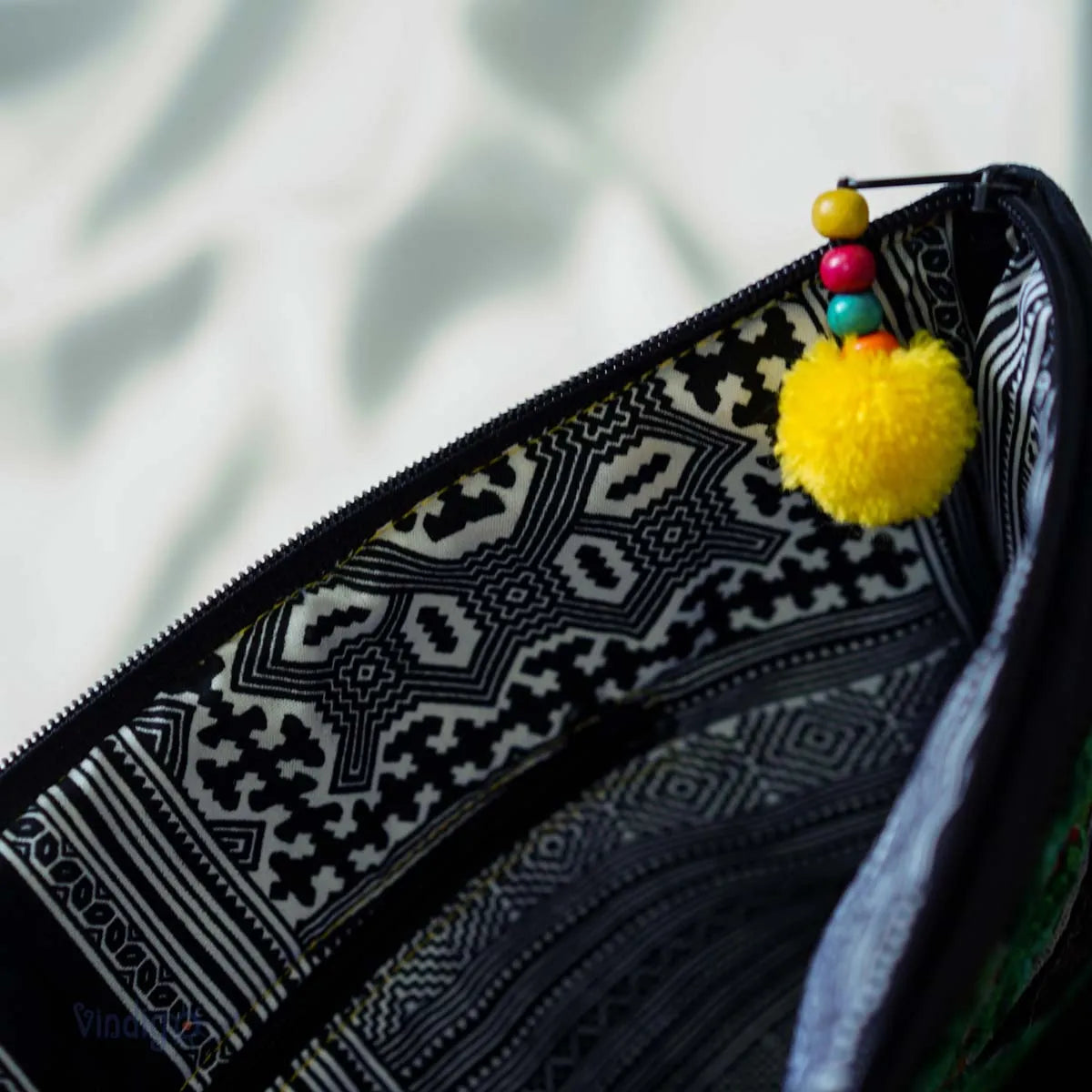 Zipper detail of Vindigo hemp clutch with geometric tribal pattern