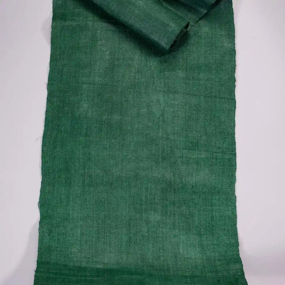 Vindigo green hemp fabric roll full top-down view