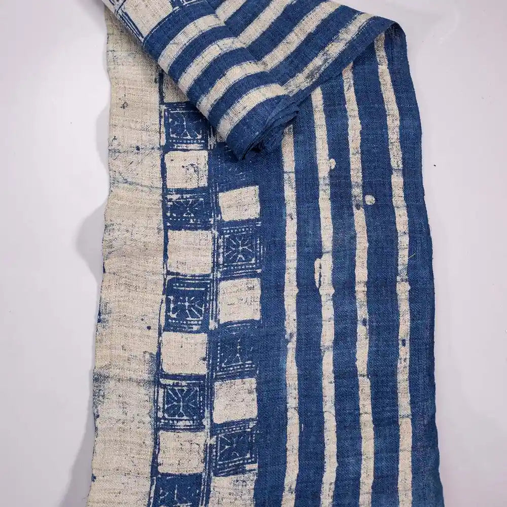Vindigo indigo fabric roll top-down view with block print