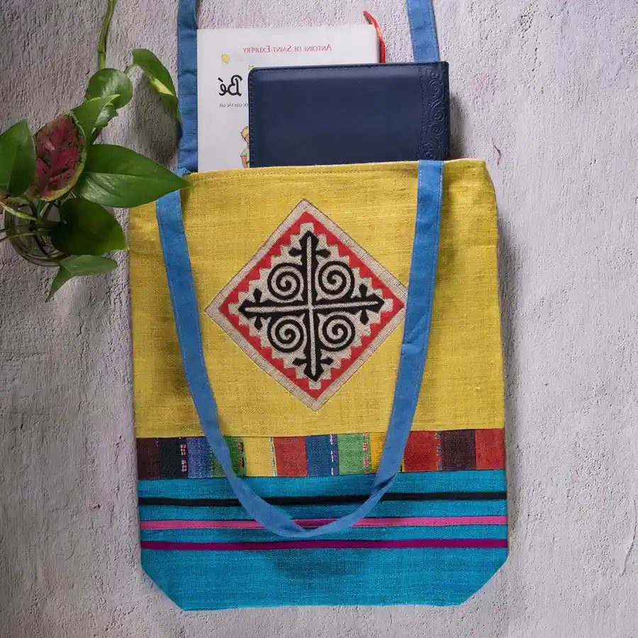 Vindigo tote bag yellow hemp hand-embroidered spiral patch front angle