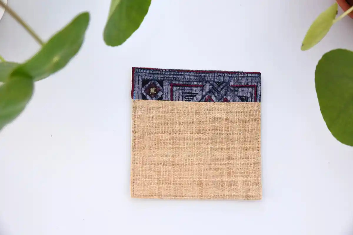 Top view of natural hemp coaster with geometric indigo design