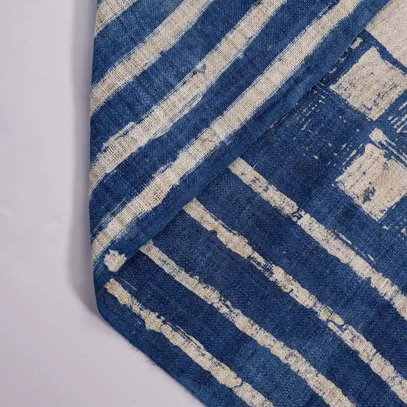 Vindigo indigo striped check fabric roll half-folded angle