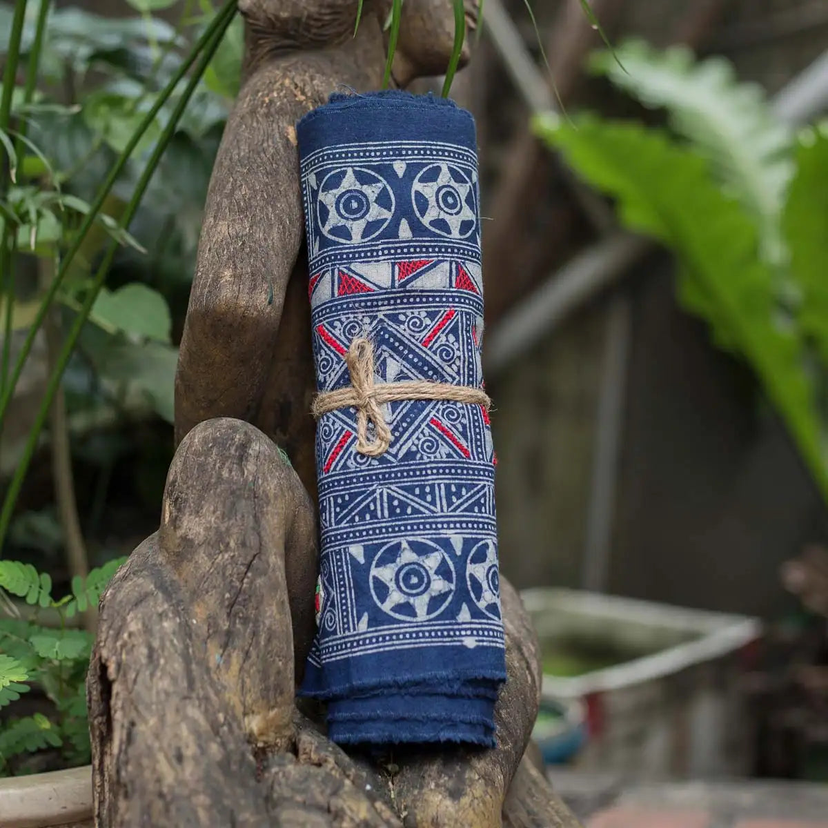 Vindigo blue hemp fabric roll styled in outdoor lifestyle scene