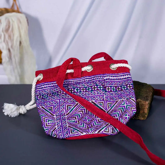 Vindigo red hemp geometric bucket bag lying flat detail view