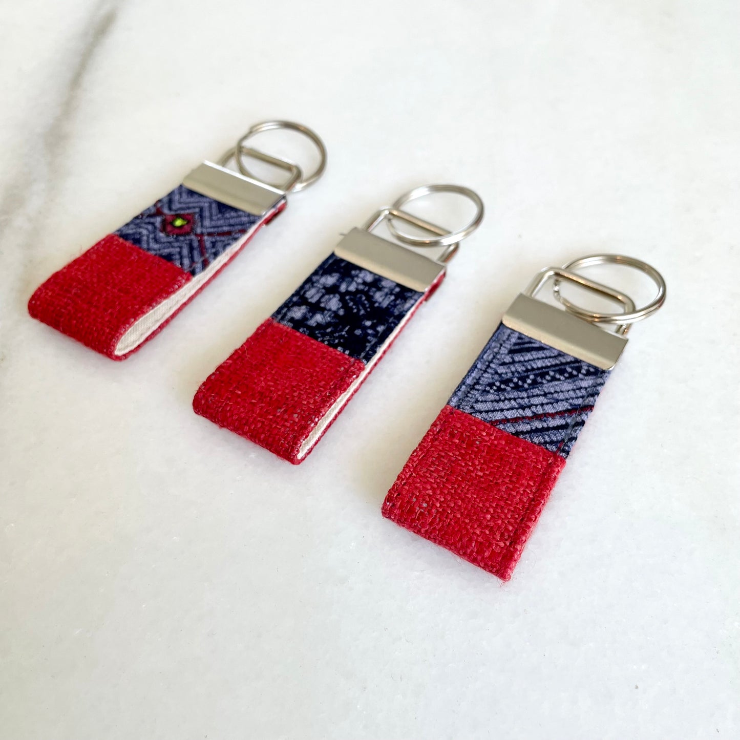 Red hemp fabric keychain with vintage batik patch, stainless metal key fob